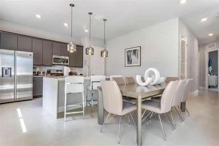 7770 SANDY RIDGE DR #110 — photo 5